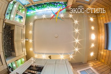 Многоуровневый потолок с подсветкой на кухне